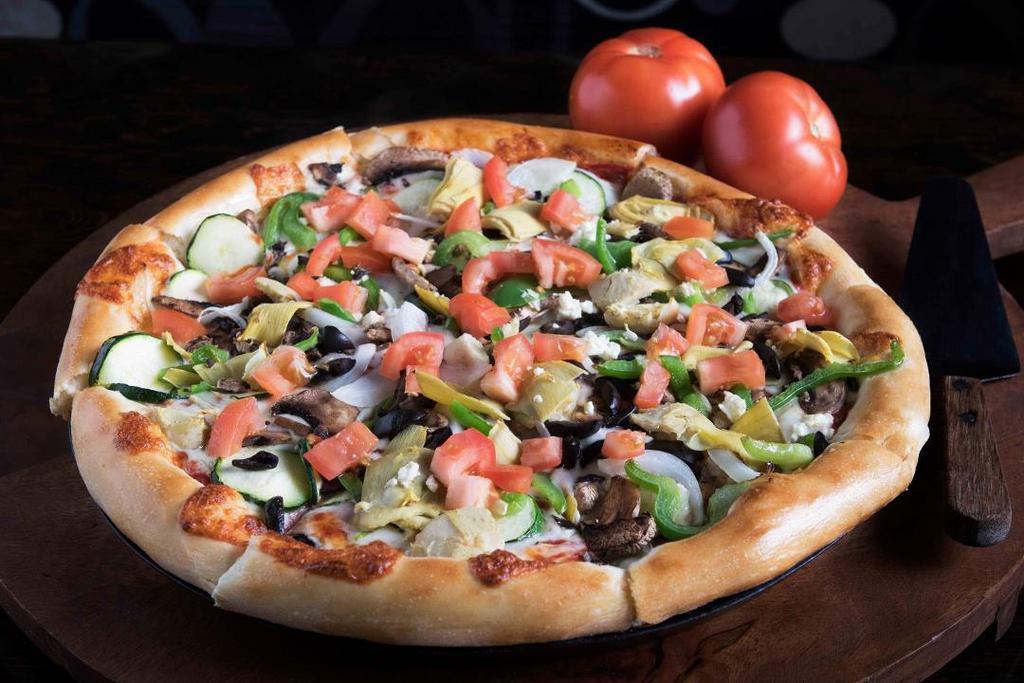 The Veghead Pizza* · Artichoke hearts, black olives, zucchini, mushrooms, yellow onions, bell peppers, feta cheese and garlic puree. Topped with fresh, diced Roma tomatoes