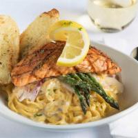 Pete'S Atlantic Salmon · Char-broiled salmon over a bed of linguine tossed with asparagus and sautéed onion in a lemo...