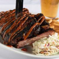 Bbq St. Louis Ribs · BBQ pork ribs slow roasted to perfection and basted with our famous homemade BBQ sauce. Serv...