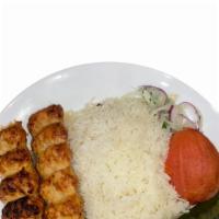 Chicken Lula Kabob · ground chicken mixed with special spices and onion includes basmati rice, grilled tomato, sh...