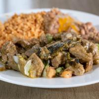 Chile Verde · Cubed pork with tomatillo green sauce.
