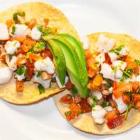 Ceviche De Pescado Or Camaron · Lemon marinated fish or shrimp, with chopped tomatoes, cilantro, onions and jalapeños served...