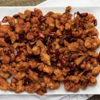 Chongqing Spicy Chicken · Popular. Served spicy. 辣子鸡丁