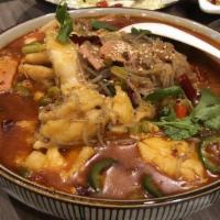 Fish Fillet In Chili Broth · Served spicy. 水煮鱼片