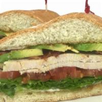 Rubyclub · Hand-carved turkey breast with thick-cut bacon, crisp lettuce, tomato, mayo, and sliced avoc...