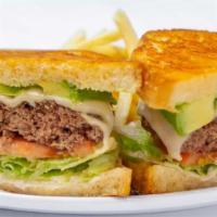 Super Burger · Melted double Swiss cheese, crisp lettuce, tomato, RubySauce, and sliced avocado. Served on ...