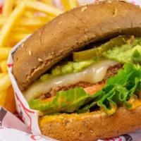 Caliente Turkey Burger · Smothered with Pepper Jack cheese, housemade guacamole, chipotle mayo, jalapeños, crisp lett...