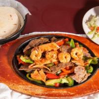 Fajitas · Red/green bell peppers, onion, carrot, broccoli, mushroom and tomato with your choice of eit...
