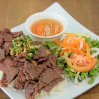 Grilled Beef - Com Tam Bo Nuong · Served w/lettuce, bean sprouts, cucumber, pickled carrots, tomatoes and house special sauce.