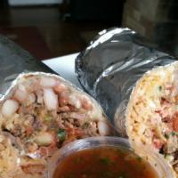Classic Burrito · Choice of meat, beans, Spanish rice, onion, cilantro and cheese.