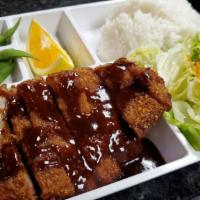 Katsu Box · Panko-battered chicken or pork served with tonkatsu sauce, served with rice and salad.