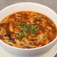 Hot & Sour Soup · Hot & Spicy. Tofu, bamboo strips, dried mushrooms, green onion.