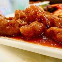 Sweet & Sour Pork · Bell pepper, onion, with sweet & sour sauce.