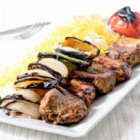Combo Shish Kabob · Marinated chunks of filet mignon & chunks of chicken breast, skewered and charbroiled to per...