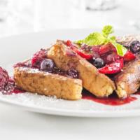 Texas French Toast · Macerated Berries, Whipped Cream, Maple Syrup