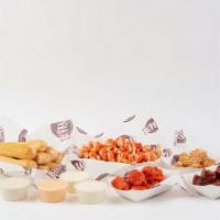 Kickoff Pack · A pack of 20 boneless wings with a choice of up to 3 sauces, one large buffalo fries, 6 brea...
