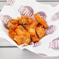 15 Piece Boneless Wings · Comes with two sauces.