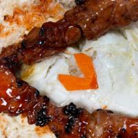 Chicken Bbq Silog (2) · Sweet and savory Filipino style bbq on a stick smothered with our house-made Filipino BBQ sa...