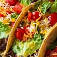 Veggie Bean Taco · Vegetarian. Black beans cooked with green olives and red bell pepper, corn tortilla, lettuce...