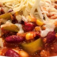 Spicy Veggie Bean Chili · Vegetarian. Includes feta cheese and diced red onion.