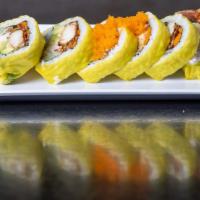 Soft Shell Crab Roll · In: soft shell crab, avocado, imitation crab, cucumber and gobo. Out: soy paper and smelt egg.