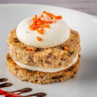 Carrot Cake · Gluten-free. Alternating layers of gluten-free carrot cake spiced with cinnamon, chopped wal...