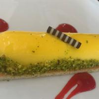 Lemon Pistachio Cheesecake (New ) · Our new cheesecake is made with the finest cream-cheese filling and a thin layer of vanilla ...