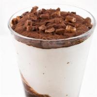 Coppa Stracciatella (Gelato Chocolate) · Chocolate chip gelato swirled together with chocolate syrup, topped with cocoa powder and ha...