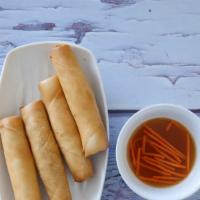 Crispy Rolls · Four fried rolls filled with carrots, jicama, vermicelli, taro, onion, and organic tofu with...