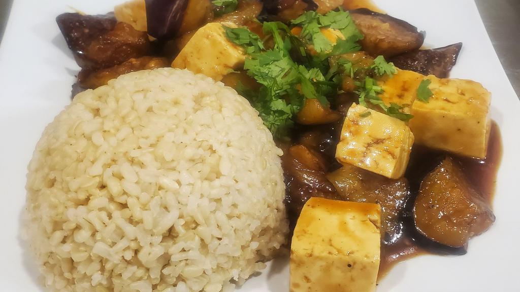Noble Eggplant · Fresh steamed organic tofu, eggplant glazed in a house special sauce topped with cilantro and served with rice.