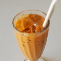 Thai Iced Tea · Fresh brewed tea with soy milk and cane sugar.