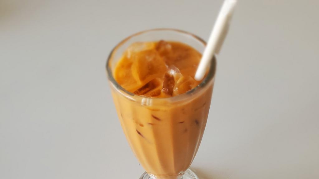 Thai Iced Tea · Fresh brewed tea with soy milk and cane sugar.