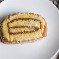 Pionono · Spongy cake filled with dulce de leche.