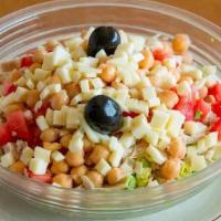 Chopped Salad · Romaine, turkey, garbanzo beans, tomatoes and mozzarella. Finely chopped, tossed with balsam...