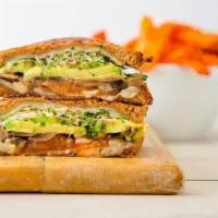 Avocado Melt Sandwich · Avocado, sauteer mushrooms, grilled tomato, Swiss cheese and alfalfa sprouts, grilled on who...