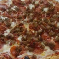 Meat Lovers Pizza · Pizza sauce, mozzarella, pepperoni, sausage, ham, meatballs, and bacon.