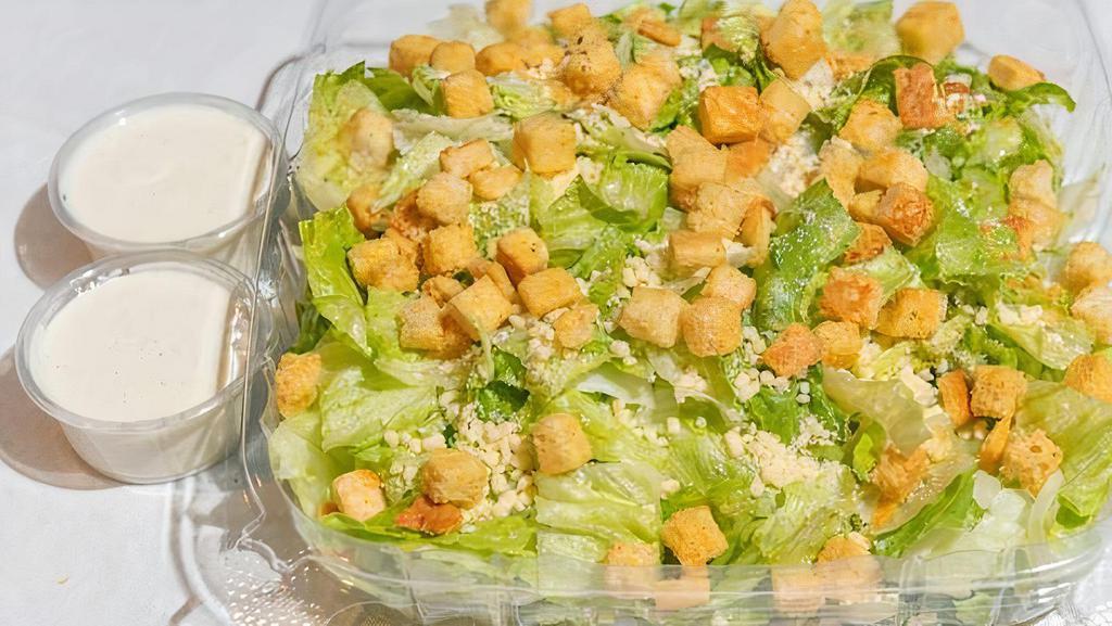 Caesar Salad · Vegetarian. Lettuce, parmesan cheese, and croutons