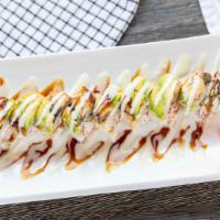 Dragon Roll · DF shrimp, crab, topped with unagi, avocado, and sweet sauce.