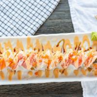 Monster Roll · DF shrimp, avocado, crab, cream cheese, spicy tuna, topped with tuna, salmon, izumidai, swee...