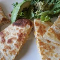 Chicken Quesadilla-Muy Sabroso · A very large grilled tortilla filled with freshly sliced chicken breast, topped with freshly...