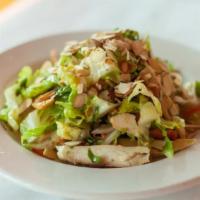 Chinese Chicken Salad · Grilled free range chicken, organic romaine, red pepper, onion, wontons, almonds and hoisin ...