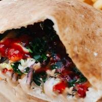 Half Pita Sandwich · Half of our House baked Pita stuffed with your choice of Protein, Add-Ons, and House-Made Sa...
