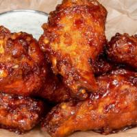 Chipotle Honey Wings · Classic Bone-In Wings in chipotle honey glaze; served with a choice of dipping sauce