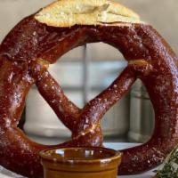 Giant Pretzel · A large Bavarian soft pretzel served with our chef's special beer cheese and whole grain mus...