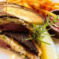 Classic Reuben Sandwich · House remoulade, sauerkraut, swiss cheese, marble rye and choice of Side.