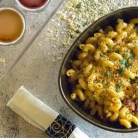 Kids Mac 'N Cheese · Curly macaroni and creamy cheese sauce