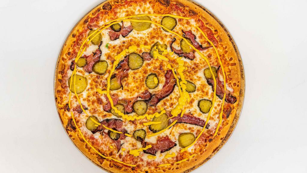 Pastrami Pizza · topped with tomato sauce, mozzarella, pastrami, pickles and mustard sauce on top.
