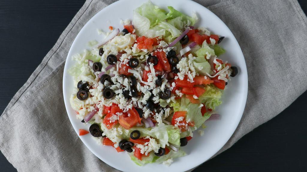 Garden Salad · Fresh lettuce, red onions, bell peppers, black olives, tomatoes, mozzarella cheese.