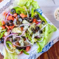 Greek Salad · Fresh lettuce, red onions, bell peppers, black olives, tomatoes, mushrooms, mozzarella chees...