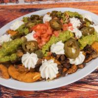 French Fries Supreme · Beans, salsa fresca, guacamole, sour cream, cheese and jalapenos. Add carne asada for additi...